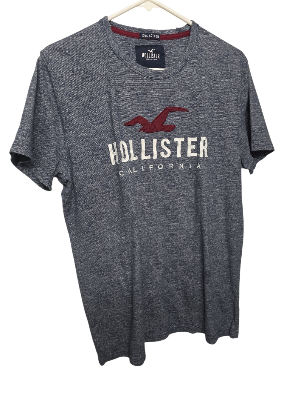 Hollister Men's Heather Navy Graphic Logo Tee with Red Emblem
